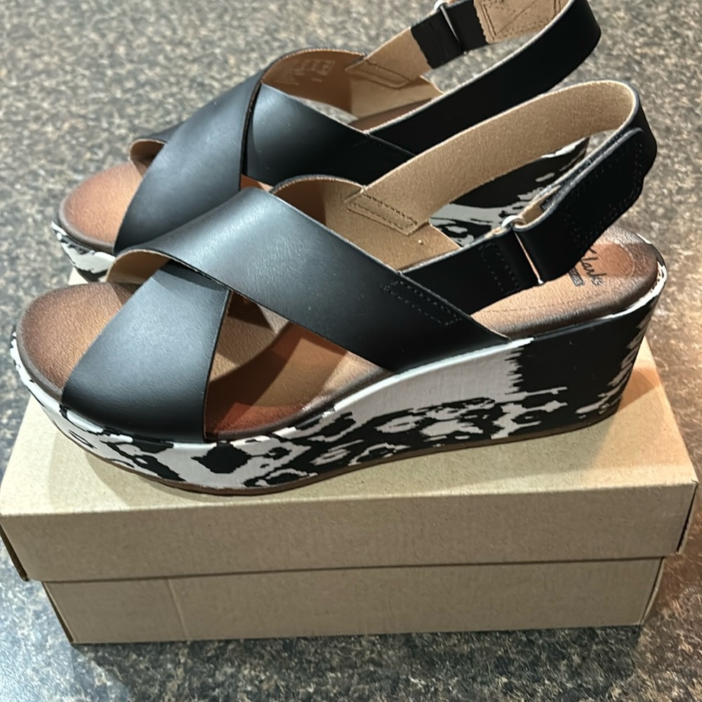 Clarks wedge sandals with black and white Ikat print